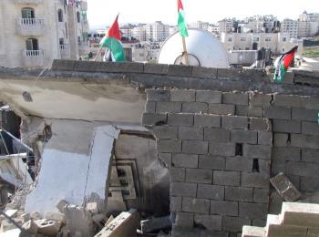 A four-story building blown up on punitive grounds in Al Am’ari refugee camp (Ramallah) on 15 December. Photo by OCHA