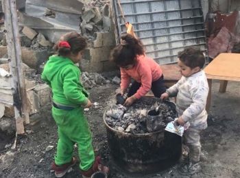 Children playing by their demolished home in Jabal Al Mukabbir, East Jerusalem, 13 January 2019.