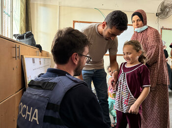 OCHA visiting a school in Gaza city where displaced people are sheltering. Photo by OCHA, 29 June 2024.