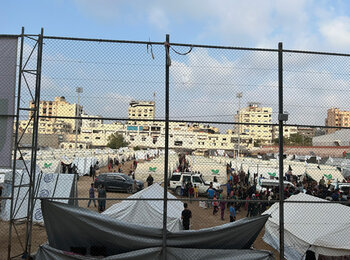 People newly displaced from North Gaza governorate staying in a stadium in Gaza city, 10 November 2024. Photo by OCHA