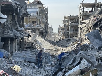 A boy amid ruins in Jabalya in North Gaza, 2 February 2025. Photo by OCHA/Olga Cherevko