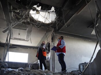 Initial assessment of damaged caused to a house during the escalation in Gaza. 13 May 2023. Credit Palestine Red Crescent Society