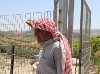 Abu Waleed, farmer and leader of the Queela community, near his house. Photo: ACF