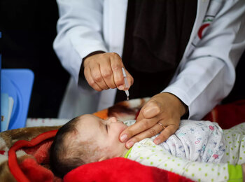 A baby receives routine vaccinations. Photo: UNICEF