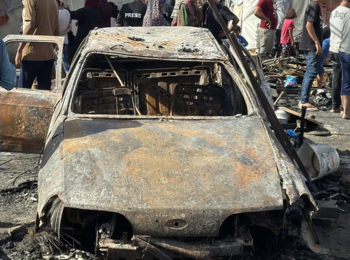 Palestinians assess the destruction caused by an Israeli airstrike on tents sheltering displaced families outside Al-Aqsa Martyrs Hospital in Deir Al-Balah, central Gaza Strip. Photo: OHCHR/Olga Cherevko