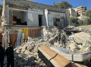 A two-storey residential building demolished by its Palestinian owner due to the lack of an Israeli-issued building permit, in Silwan, East Jerusalem. Some 39 people became displaced. 5 January 2025. Photo: OCHA.