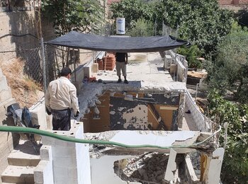 15 August 2021: A Palestinian family was forced to start self-demolishing their residential house for lacking a building permit in Silwan in East Jerusalem.©Photo by OCHA