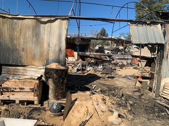 Dozens of Israeli settlers set fire to three houses, a nursery, a carpentry shop, and to at least five vehicles in Jinsafut, Qalqilya. Photo: OCHA 