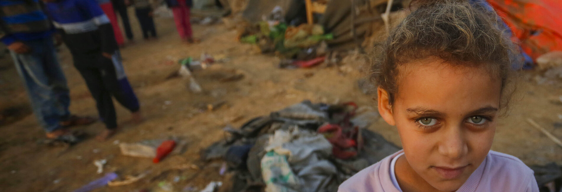 A Palestinian girl at a site hosting displaced people in Gaza. Photo by UNRWA