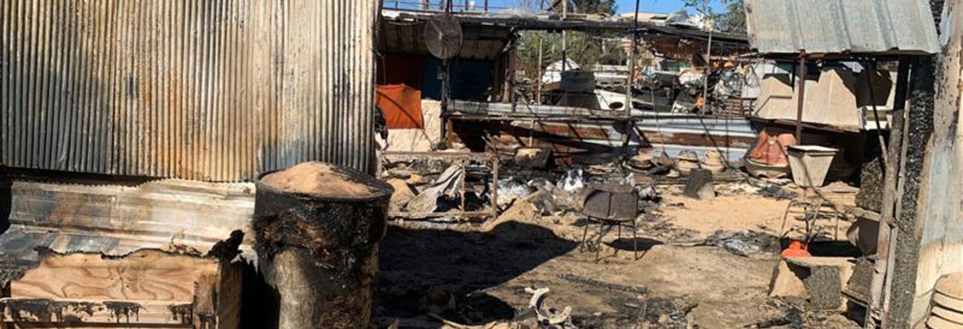 Dozens of Israeli settlers set fire to three houses, a nursery, a carpentry shop, and to at least five vehicles in Jinsafut, Qalqilya. Photo: OCHA 