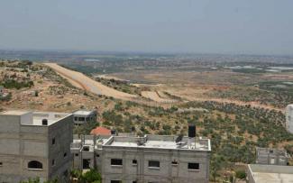 Barrier in Jayyus, Qalqilia governorate, May 2014. Photo by OCHA