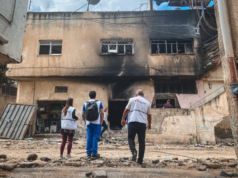 A humanitarian team observing damage to a structure in the aftermath of the two-day Israeli operation in the Jenin Refugee Camp. Photo by Médecins Sans Frontières, 5 July 2023