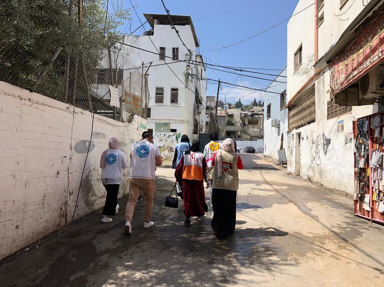 A humanitarian team of multiple organizations in Jenin Refugee Camp, in the aftermath of the two-day Israeli operation. ©Photo by YMCA, 6 July 2023.