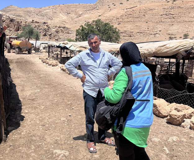 A Palestinian herder sharing information as part of the urgent assessment. Photo by OCHA